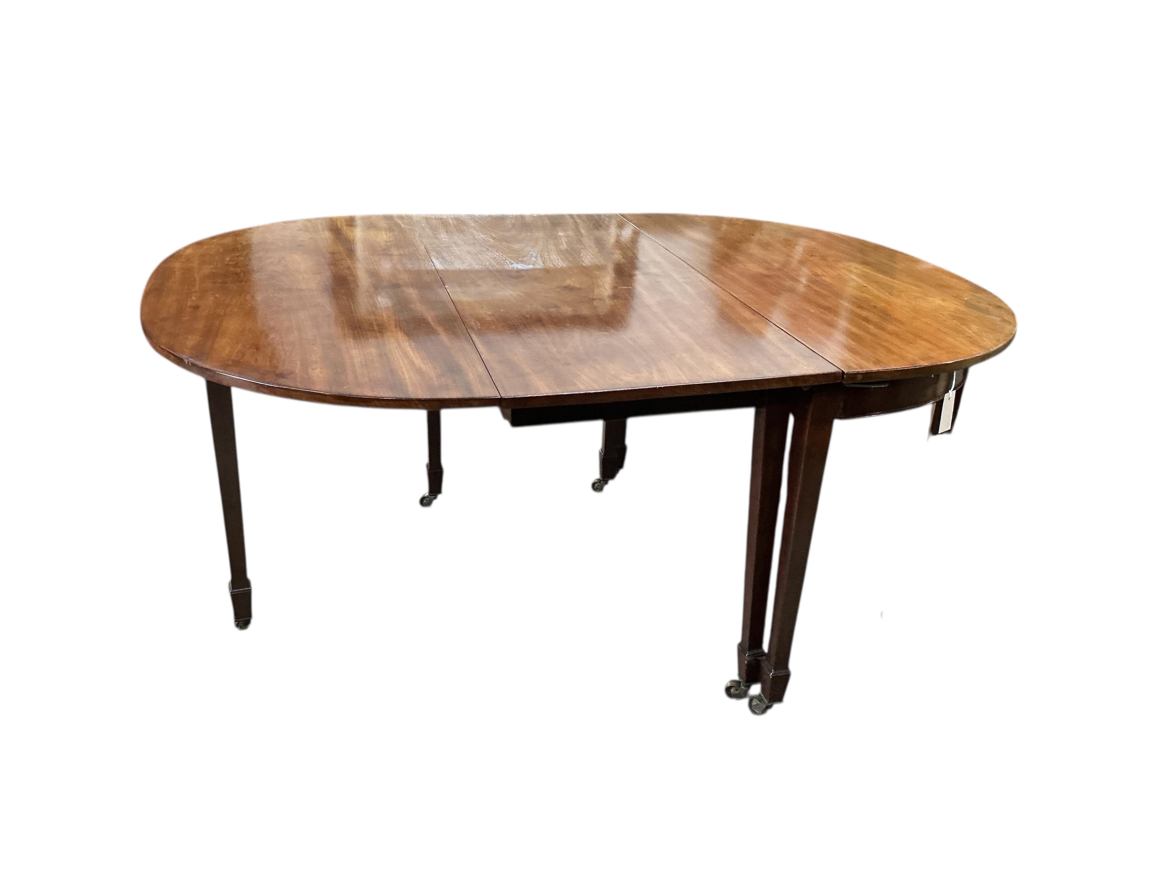 A George III and later mahogany D end extending dining table, width 217cm extended, one spare leaf, depth 122cm, height 76cm